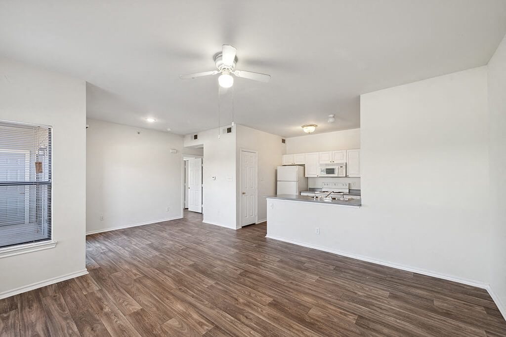 Vacant Kitchen and Living Room 2 Bedroom at Tivoli apartments in Dallas TX
